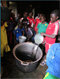 group of kids fetching water